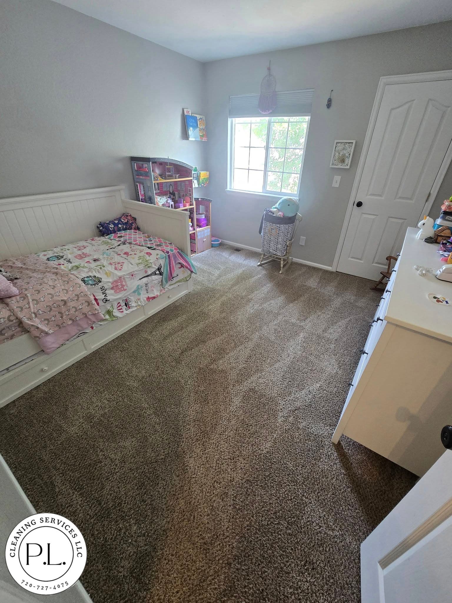 Bedroom with pink-patterned bedding