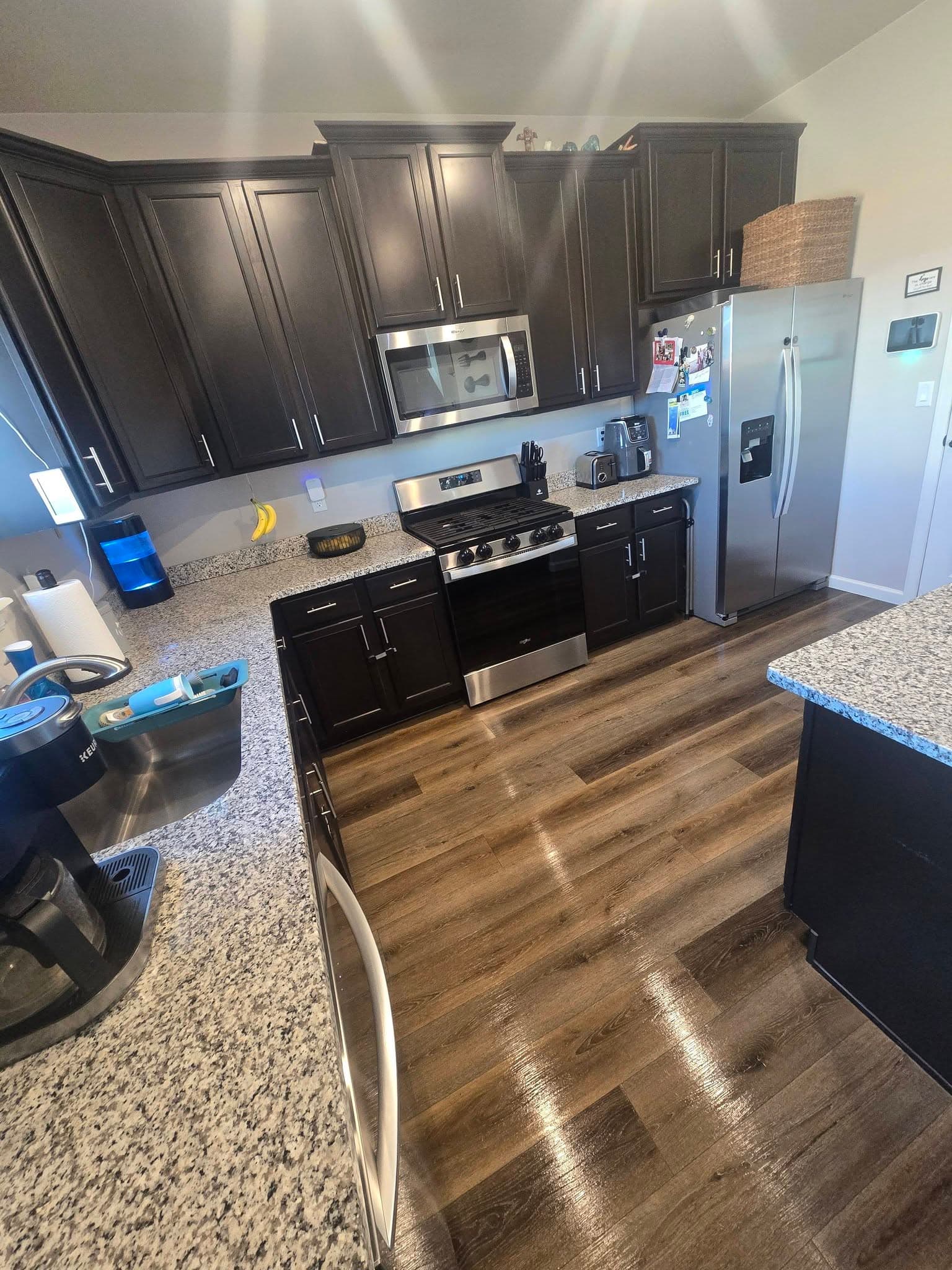 Modern kitchen with dark cabinetry