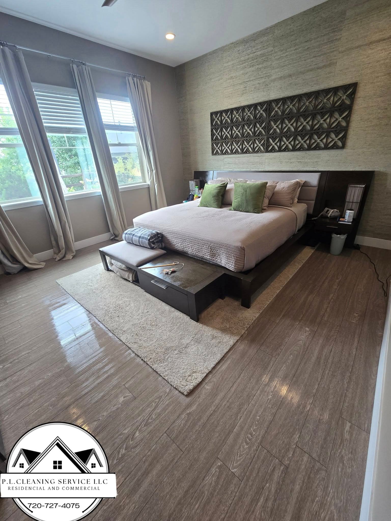 Bedroom with modern platform bed and hardwood flooring