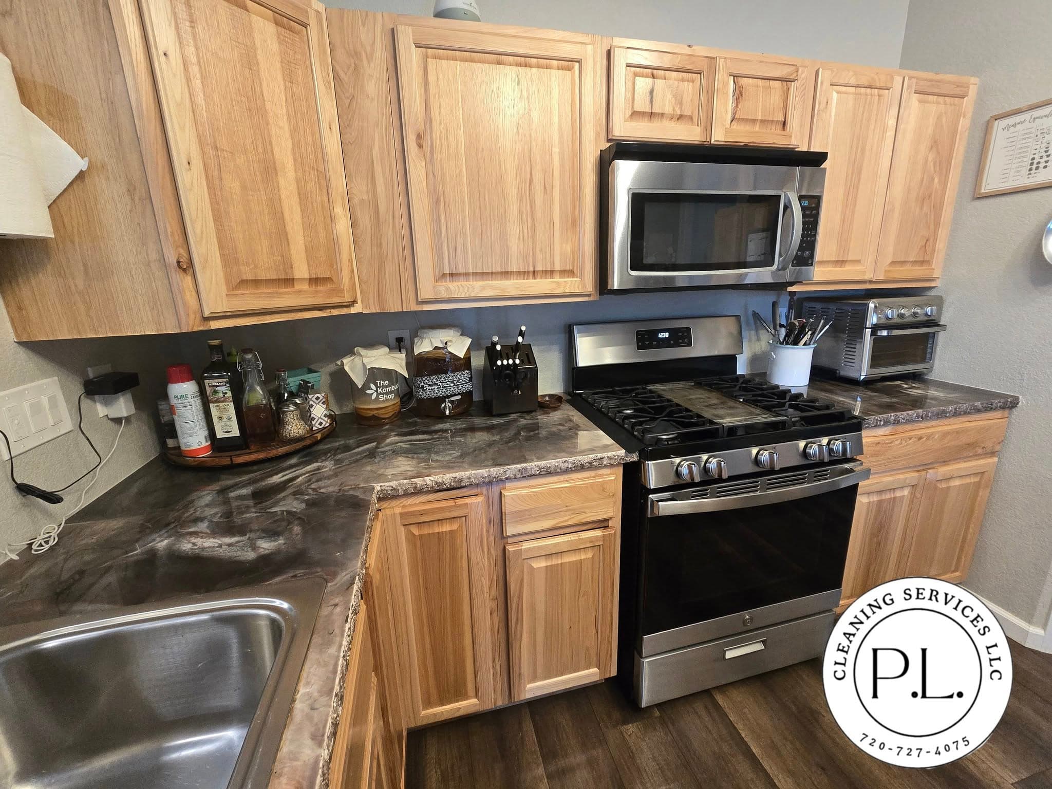 Kitchen with light wood cabinets