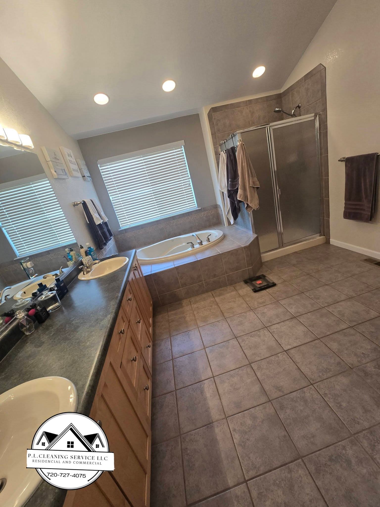 Bathroom with vanity and mirror