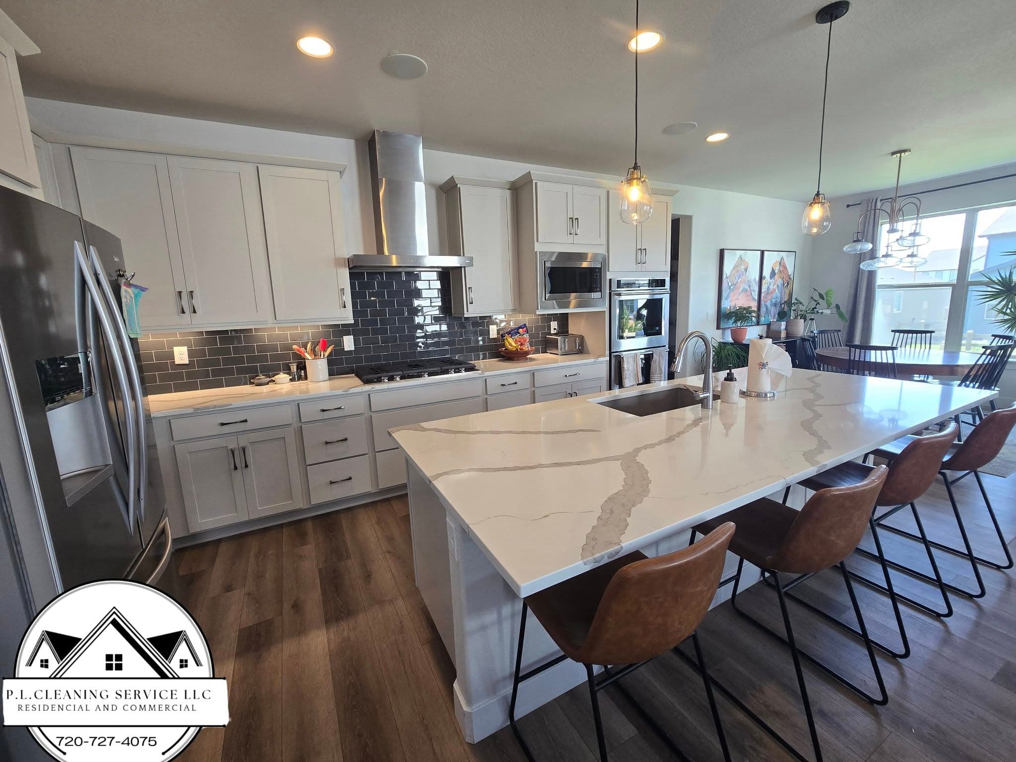 Modern kitchen with white cabinetry and island