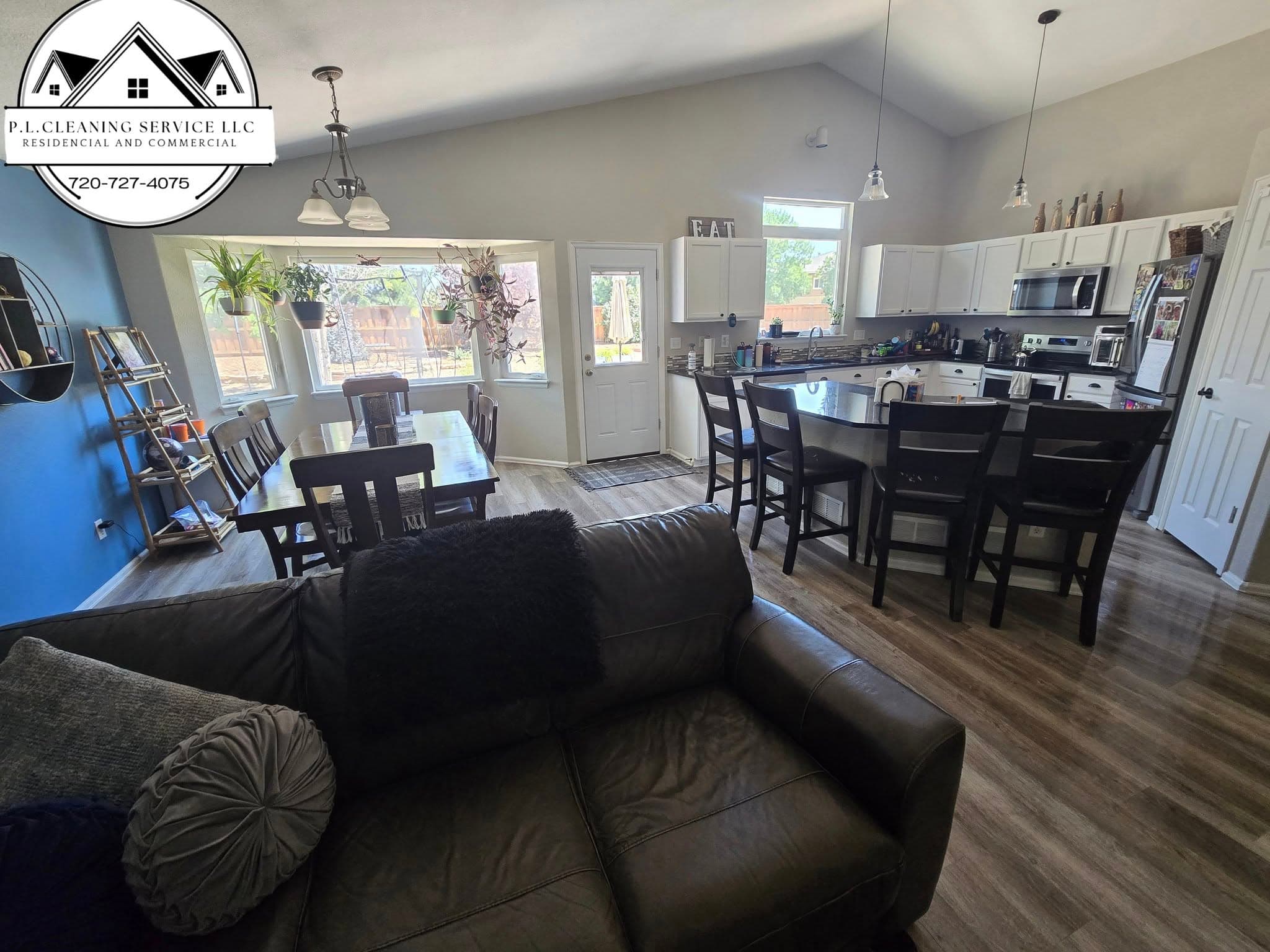 Living room with kitchen visible