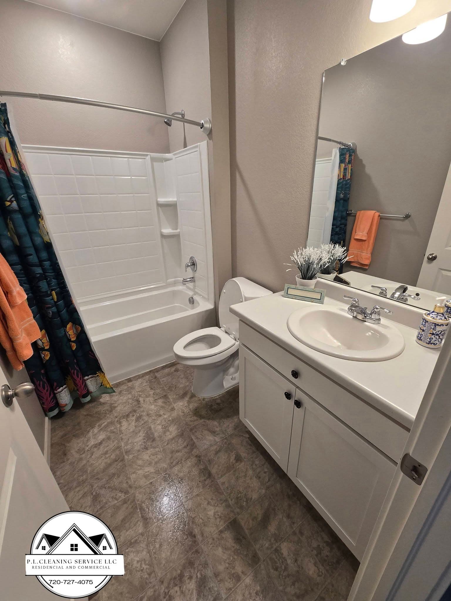Finished bathroom with white vanity